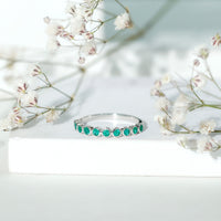 Natural Emerald Half Eternity Ring in Bezel Set