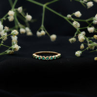Natural Emerald Half Eternity Ring in Bezel Set