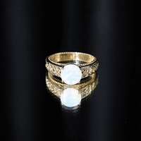 Ethiopian Opal Celtic Knot Engagement Ring with Surprise Diamond