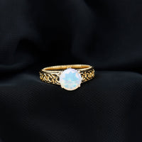 Ethiopian Opal Celtic Knot Engagement Ring with Surprise Diamond