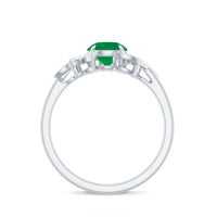 Natural 0.4 carat emerald engagement ring by Rosec Jewels featuring diamond accents and a gold band.