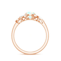 Ethiopian Opal and diamond engagement ring featuring nature-inspired design, set in a elegant ring from Rosec Jewels.