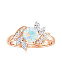 Ethiopian Opal and diamond engagement ring featuring a nature-inspired design, crafted by Rosec Jewels.