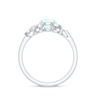 Ethiopian Opal and diamond engagement ring featuring nature-inspired design, crafted by Rosec Jewels.