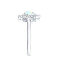 Ethiopian Opal and diamond engagement ring by Rosec Jewels featuring a nature-inspired design with sparkling gemstones.