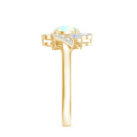Ethiopian opal and diamond engagement ring featuring a nature-inspired design by Rosec Jewels, with sparkling gemstones and intricate details.