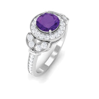 Vintage-style amethyst and diamond halo engagement ring by Rosec Jewels, featuring a central purple gemstone with sparkling accents.