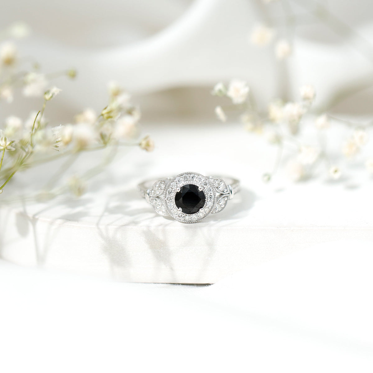 Vintage-looking 1.3 carat lab-grown black diamond engagement ring with white diamond accents, featuring Rosec Jewels craftsmanship.