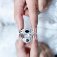 Vintage-style 1.3 carat lab-grown black diamond engagement ring with white diamond accents from Rosec Jewels.