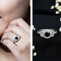 Vintage style 1.3 carat lab-grown black diamond engagement ring with white diamond from Rosec Jewels, showcasing intricate metalwork.