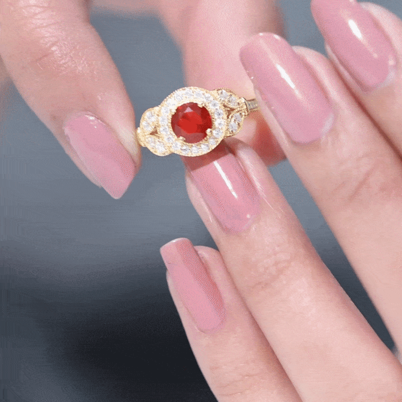 Vintage-inspired Fire Opal engagement ring with diamonds featuring a central fire opal and diamond accents, crafted by Rosec Jewels.