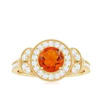 Vintage-inspired fire opal engagement ring with diamond accents, featuring intricate detailing and rose gold finish by Rosec Jewels.
