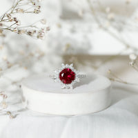 Lab Created Ruby and Diamond Halo Engagement Ring