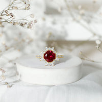 Lab Created Ruby and Diamond Halo Engagement Ring