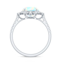 Natural 8mm Ethiopian Opal halo engagement ring with side stones, featuring a silver band and intricate design by Rosec Jewels.