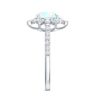 Natural 8mm Ethiopian Opal halo engagement ring with side stones from Rosec Jewels, showcasing the sparkling gemstone and detailed design.