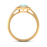 Oval 1 Carat Aquamarine engagement ring with diamond halo by Rosec Jewels featuring a silver band and intricate setting.