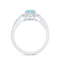 Oval engagement ring with 1 carat aquamarine and diamond accents, featuring a rose gold band from Rosec Jewels.