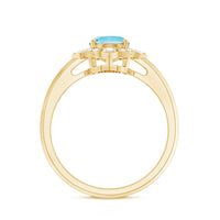 Oval engagement ring by Rosec Jewels featuring a 1-carat aquamarine center stone with diamond accents.