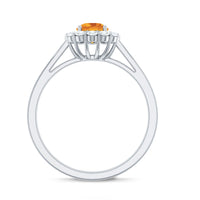 Natural citrine promise ring with diamond halo from Rosec Jewels, showcasing a gold band and sparkling gemstone centerpiece.