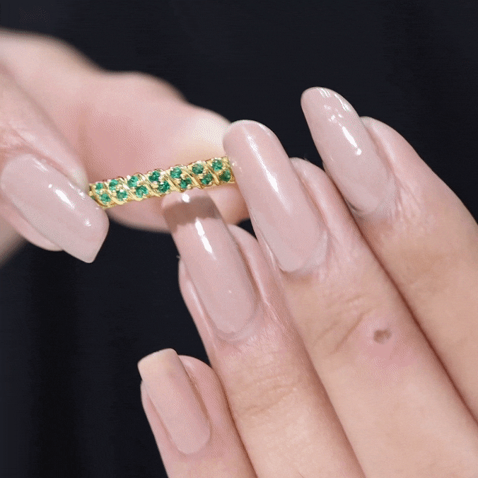 Yellow gold lab-grown emerald half eternity ring with alternating emerald stones and diamond accents, crafted by Rosec Jewels.