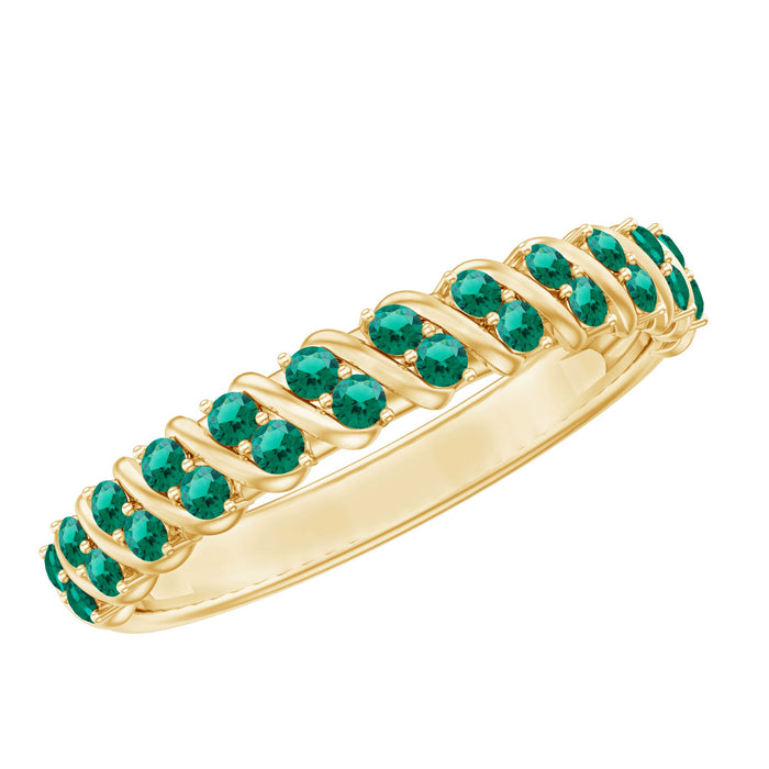 Lab grown emerald half eternity ring by Rosec Jewels featuring a row of vibrant emeralds set in a sleek band.