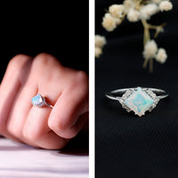 Natural Ethiopian opal princess cut engagement ring with diamond accents from Rosec Jewels, showcasing the elegant ring design.