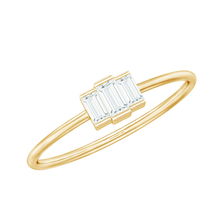 Minimalist Rosec Jewels three-stone baguette cut moissanite promise ring with sleek design and sparkling gemstones.