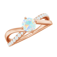 Natural Ethiopian rainbow opal diamond engagement ring with twisted shank, showcasing vibrant colors and intricate design.