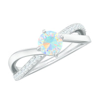Natural Ethiopian Rainbow Opal diamond engagement ring with twisted shank, showcasing vibrant colors and intricate design.