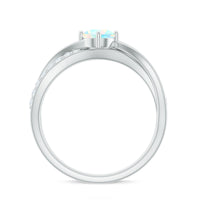 Natural Ethiopian rainbow opal diamond engagement ring with twisted shank, featuring vibrant colors and elegant design from Rosec Jewels.