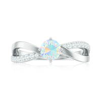 Ethiopian Rainbow Opal diamond engagement ring with twisted shank, featuring vibrant color and intricate design from Rosec Jewels.