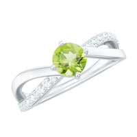 Natural 0.5 carat peridot infinity promise ring with diamonds from Rosec Jewels, showcasing a silver band with green peridot and sparkling diamonds.