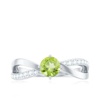 Natural 0.5 carat peridot infinity promise ring with diamond accents, crafted by Rosec Jewels, featuring a sleek gold band.