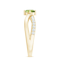 Natural 0.5 Carat Peridot infinity promise ring with diamond from Rosec Jewels, featuring a green peridot centerpiece and intricate band design.
