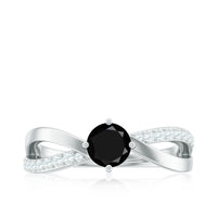 Certified black spinel promise ring with diamond accents from Rosec Jewels, showcasing a sleek silver band and sparkling gemstones.