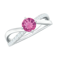 Rosec Jewels pink tourmaline solitaire and diamond infinity ring, showcasing a 1/2 CT pink gemstone with sparkling accents.