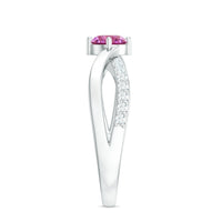 Pink tourmaline and diamond infinity ring from Rosec Jewels, featuring a 1/2 carat solitaire pink gemstone with delicate band details.