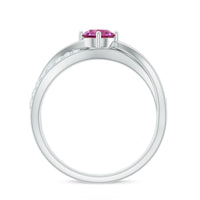 Pink tourmaline and diamond infinity ring by Rosec Jewels featuring a 1/2 carat solitaire pink tourmaline and diamond accents.