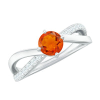 Rosec Jewels 1/2 CT fire opal solitaire and diamond infinity ring with gold band, showcasing the vibrant fire opal and sparkling diamonds.