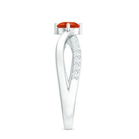 Rosec Jewels 1/2 CT fire opal solitaire infinity ring with diamond accents, featuring a vibrant orange fire opal centerpiece.