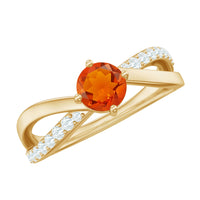Elegant 1/2 carat fire opal solitaire and diamond infinity ring by Rosec Jewels, featuring a sparkling fire opal centerpiece and delicate band.