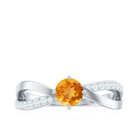 Certified real citrine engagement ring with diamond criss-cross shank, featuring a sparkling citrine gemstone and intricate gold band.