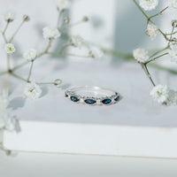Genuine London Blue Topaz Half Eternity Ring in Bezel Set