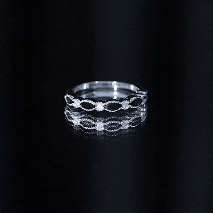 Natural marquise cut black onyx half eternity ring by Rosec Jewels featuring a continuous row of black onyx stones.