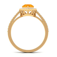 Real 0.6 carat fire opal teardrop engagement ring with diamond halo, showcasing a sparkling gemstone and elegant design.