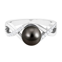 Tahitian Pearl and diamond infinity crossover engagement ring by Rosec Jewels featuring black pearl, white diamonds, and platinum band