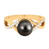 Tahitian pearl crossover diamond infinity engagement ring by Rosec Jewels featuring black pearl and sparkling diamonds on a silver band