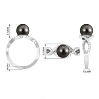 Tahitian pearl crossover diamond infinity engagement ring with rose gold band, featuring shimmering diamonds and a central Tahitian pearl.