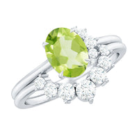Oval 1 carat peridot engagement ring with diamond wedding band from Rosec Jewels, showcasing the vibrant green gemstone and sparkling accents.